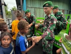 Pos Kout Satgas Yonif 125/SMB Bagikan Bubur Kacang Hijau Kepada Masyarakat Dalam Kegiatan Si’mbisa Berbagi Kasih